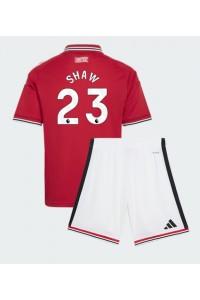 Manchester United Luke Shaw #23 Jalkapallovaatteet Lasten Kotipeliasu 2026-27 Lyhythihainen (+ Lyhyet housut)
